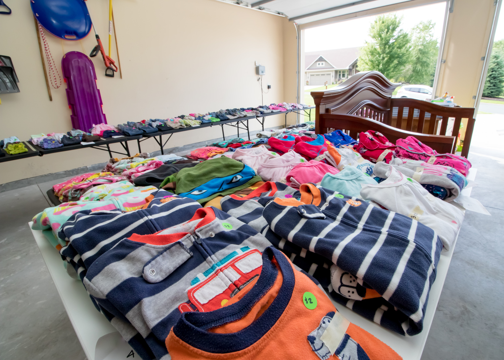 Garage-Sale-Clothes-on-Table