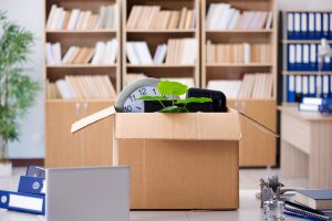 Box of Items on Desk