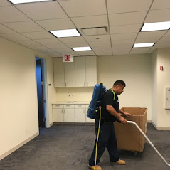Mover Cleaning Out Space